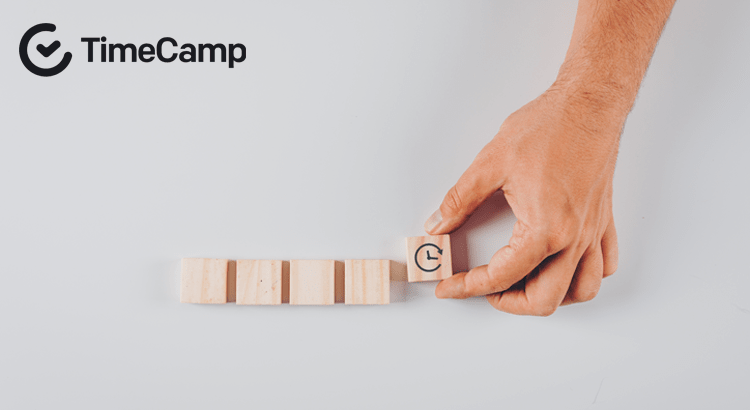 a hand and wooden blocks